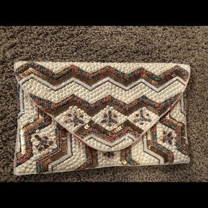 Cream envelop style beaded clutch